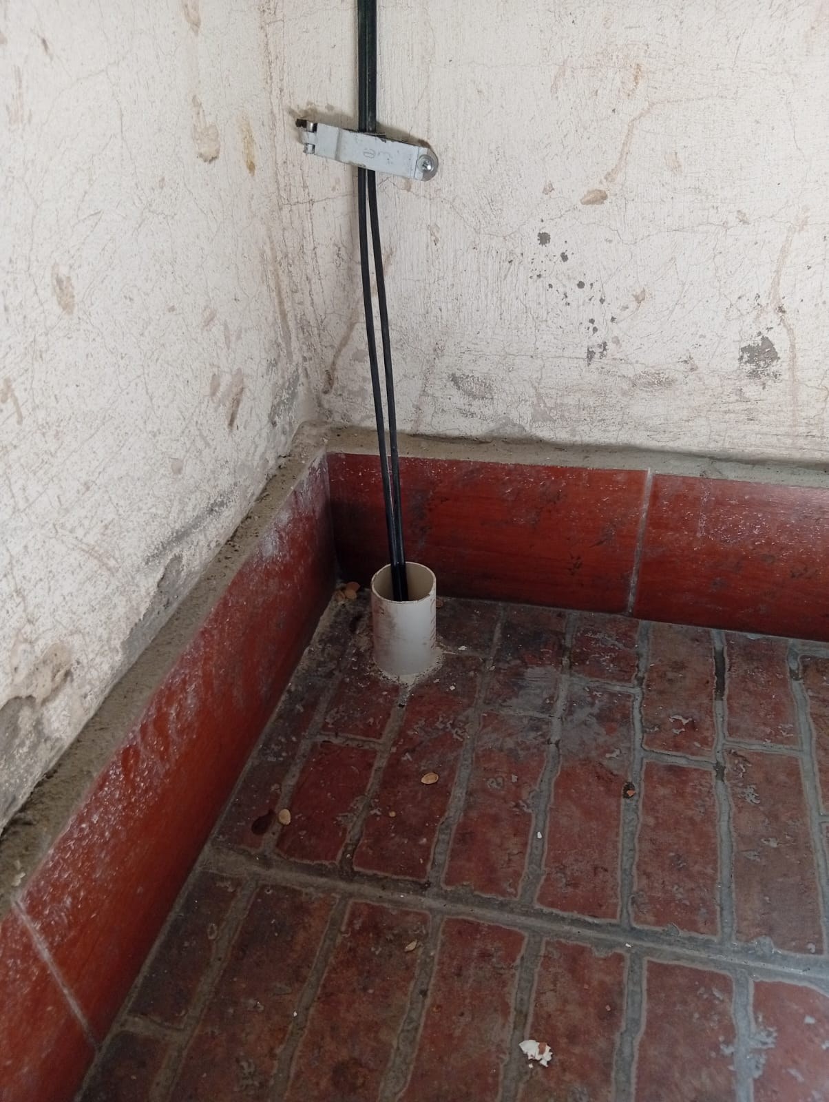 FTTH cable entering protective conduit